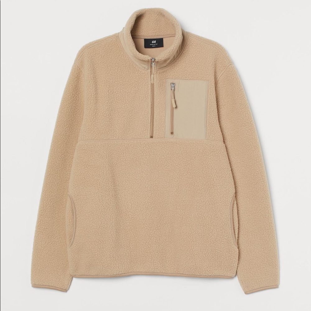 Beige. Half-zip jacket. Very soft. Only worn a few times.